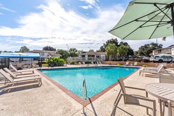 sparkling pool and sundeck at 701 South Apartments in Mobile, AL